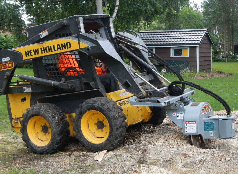 Stacked seasoned firewood prepared for customers